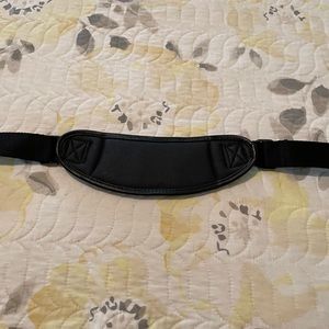 Centrios carrying strap and tan colored strap